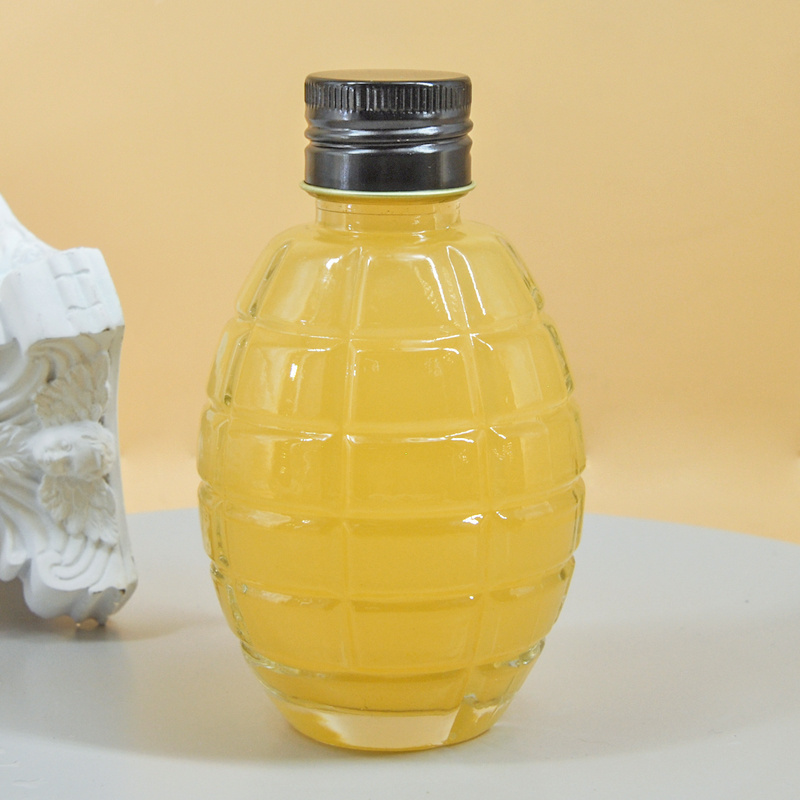 High quality empty 200ml grenade shape glass bottle with screw cap