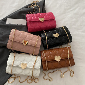 2024 New Fashion PU Leather Pillow-shaped Handbags Ladies Fashion Heart Pattern Pure Color Sling Shoulder Bag