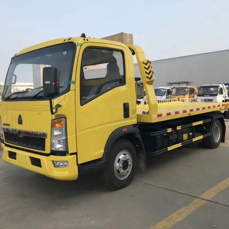 Sinotruk HOWO 4X2 Flatbed tilt tray wrecker truck 3 ton 5 tons tow truck for sale