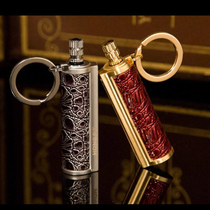 Wholesale leather wrapped metal rod keychain matching lighter waterproof kerosene oil lighter