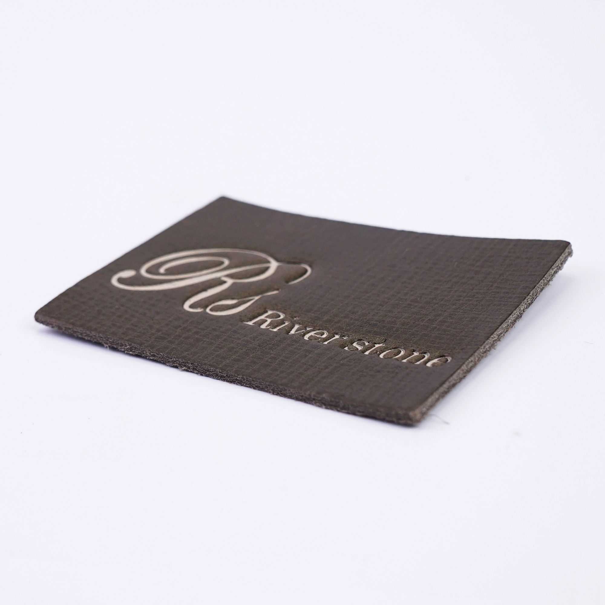 High Quality Hot Stamping Custom Logo Embossed Real Leather Label Patches for Jeans and Bags