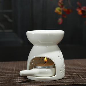 New Decoration Ceramic Essential Oil Candle Burner Hollow White Wax Melt Burner Essential Fragrance Oil Burner for Yoga Spa