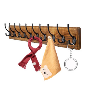 Hot selling wall-mounted multi-function multi-hook storage daily necessities wooden home wall rack.