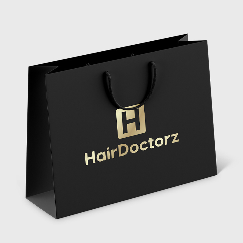 Cheap eco friendly glossy laminated custom logo print cardboard jewelry shopping packaging paper bag