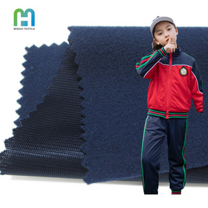 Anti-wrinkle school trouser fabric polyester tricot fleece super poly sportswear fabric for child bottom tracksuit