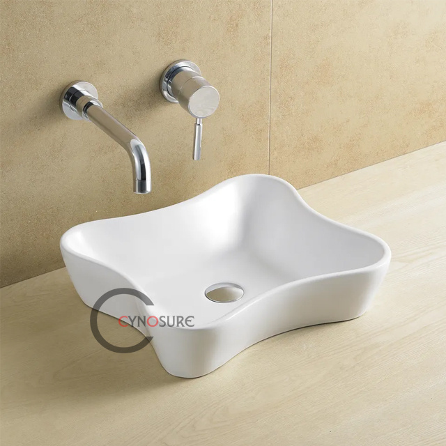 Trendy Ceramic Washing Basin Sink Irregular Porcelain Wash Basin Over Counter Bathroom Basin Sink