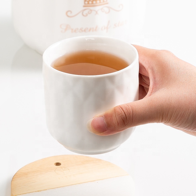 Gift Box included White Embossed Ceramic 4 Piece of Cup Set and Tea Pot with Bamboo handle and Bamboo Tray for Four Person Use