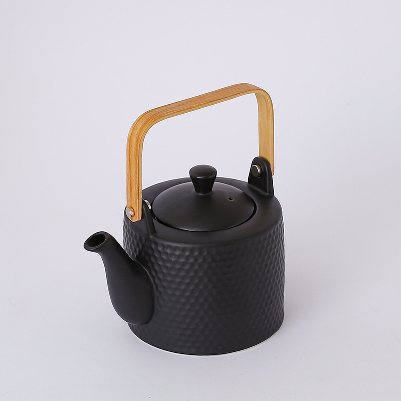 Guangdong OEM Honeycomb Pattern Household Ceramic Tea Pot Wooden Handle Black Tetera Teapot Kettle