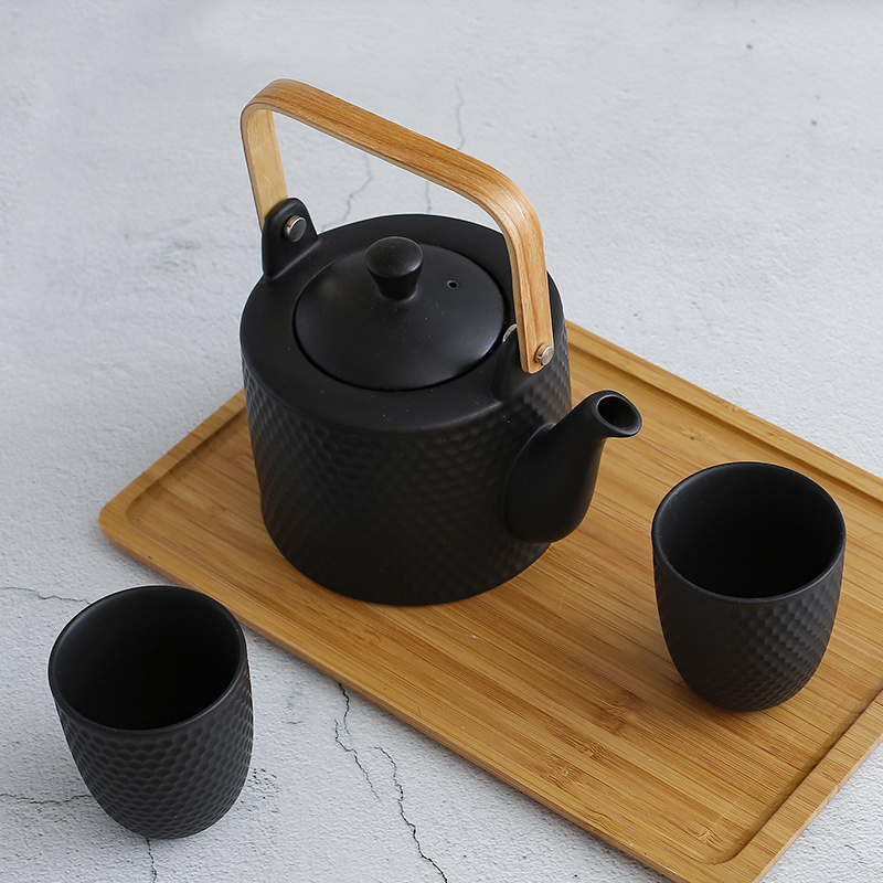 Guangdong OEM Honeycomb Pattern Household Ceramic Tea Pot Wooden Handle Black Tetera Teapot Kettle