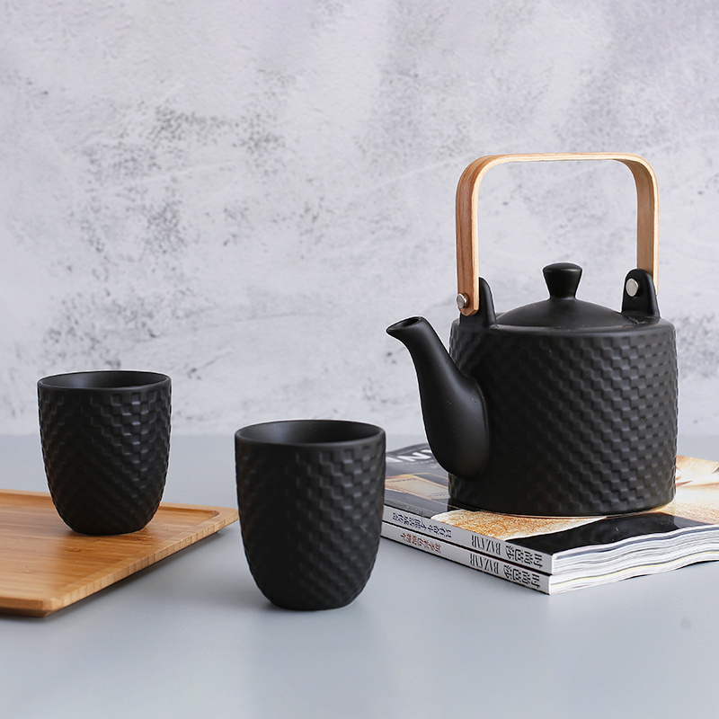 Hot Selling 800 ML Custom Embossed Pattern Porcelain Tea pot Ceramic Matte Black Teapot With Wood Handle