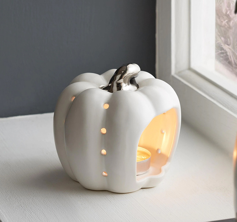 Unique nordic style fancy golden pumpkin design luxurious tea light candle holder ceramic candle jar