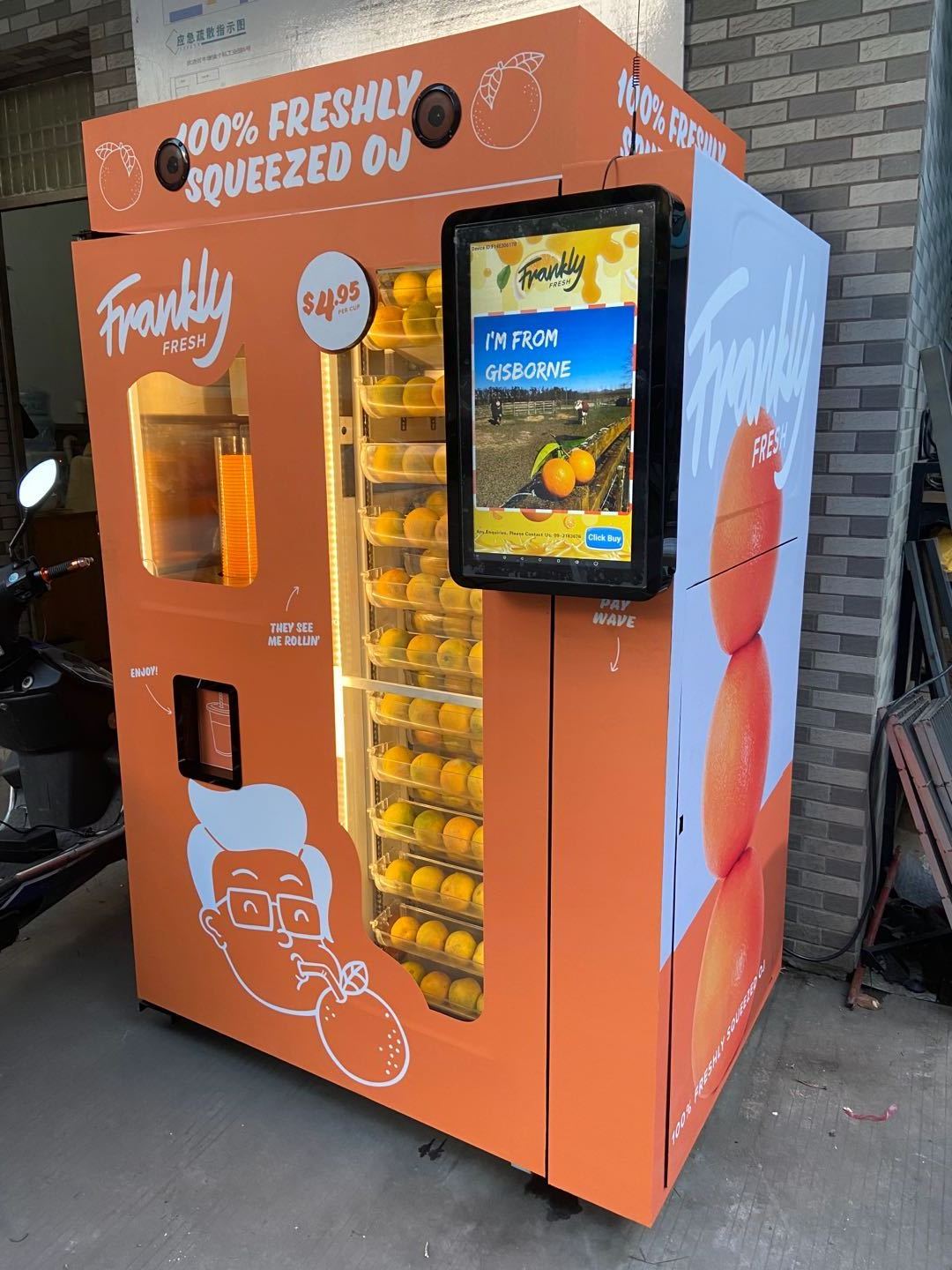 orange juice vending machine charging by mobile phone and coin to Kenya