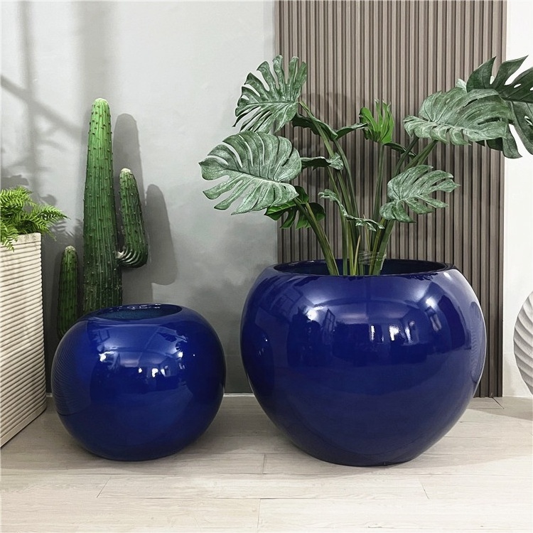 Fiberglass round shape large flower pots with custom sphere outdoor clay flower pots with classic green plants