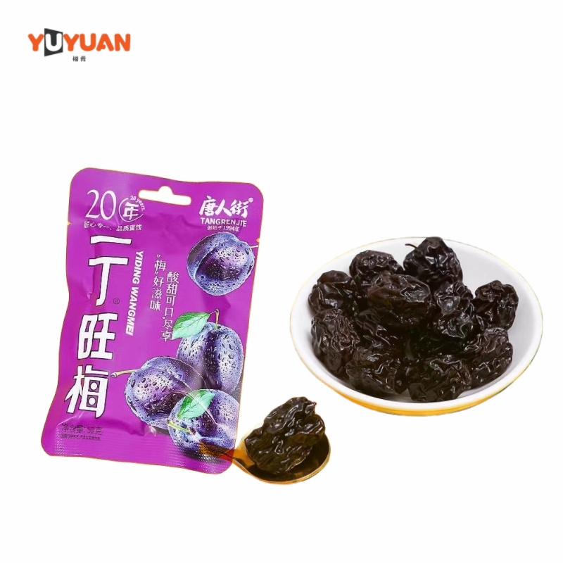 Sour-sweet and tasty preserved prune dried plum for appetizing snacks