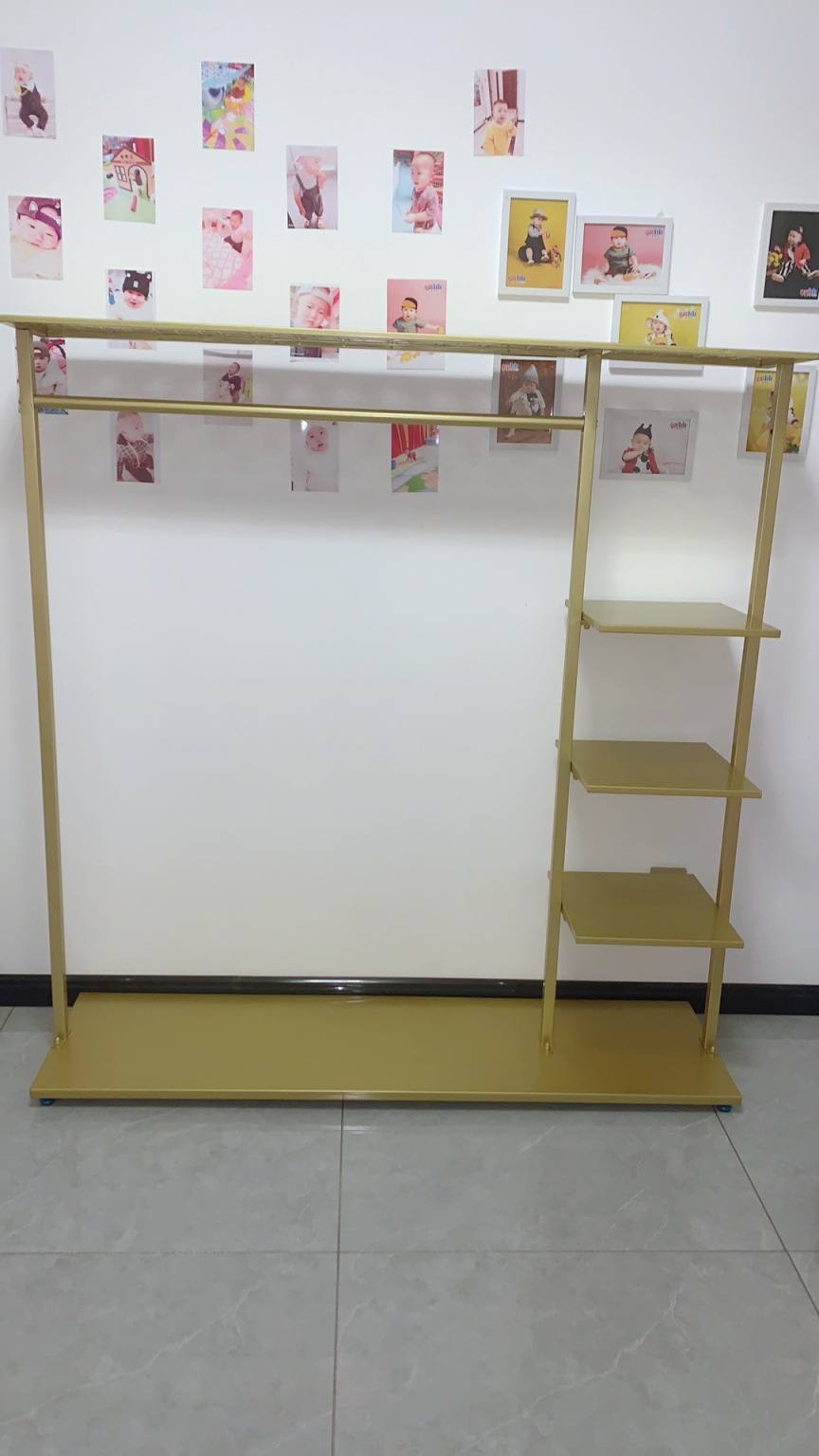 Chinese manufacturer wholesale custom design rose gold clothing racks clothes display racks shelf for clothing shop