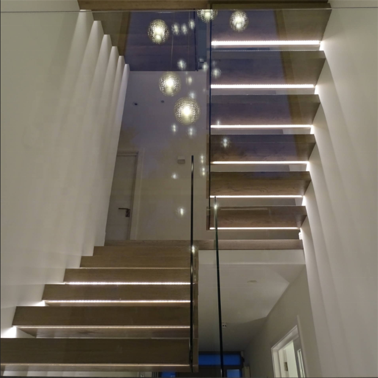 DAIYA wooden floating stair with big landing led light toughened glass railing