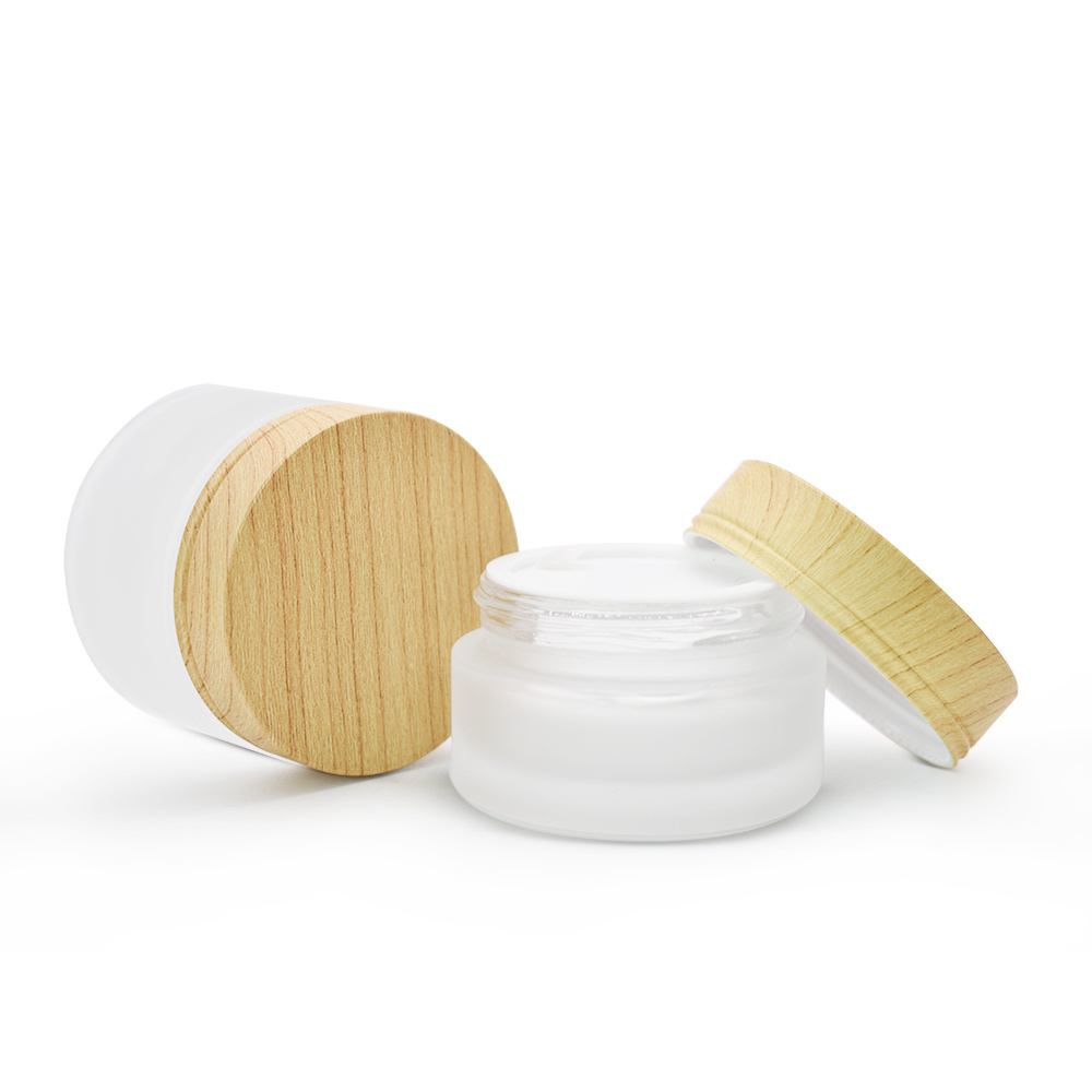 Wholesale price cream cosmetic glass jars with bamboo cap for lady face cream