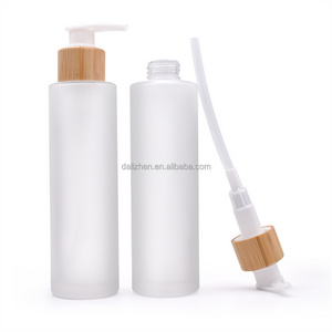 Eco Friendly Cosmetic Skincare Packaging 50Ml 60Ml 80Ml 100Ml Bamboo Lid Frosted Glass Serum Lotion Pump Bottle