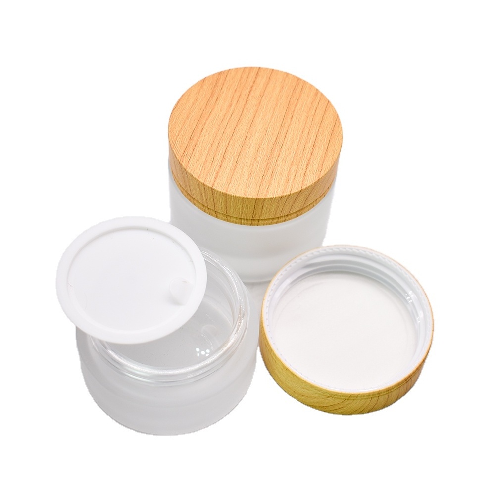 Wholesale price cream cosmetic glass jars with bamboo cap for lady face cream