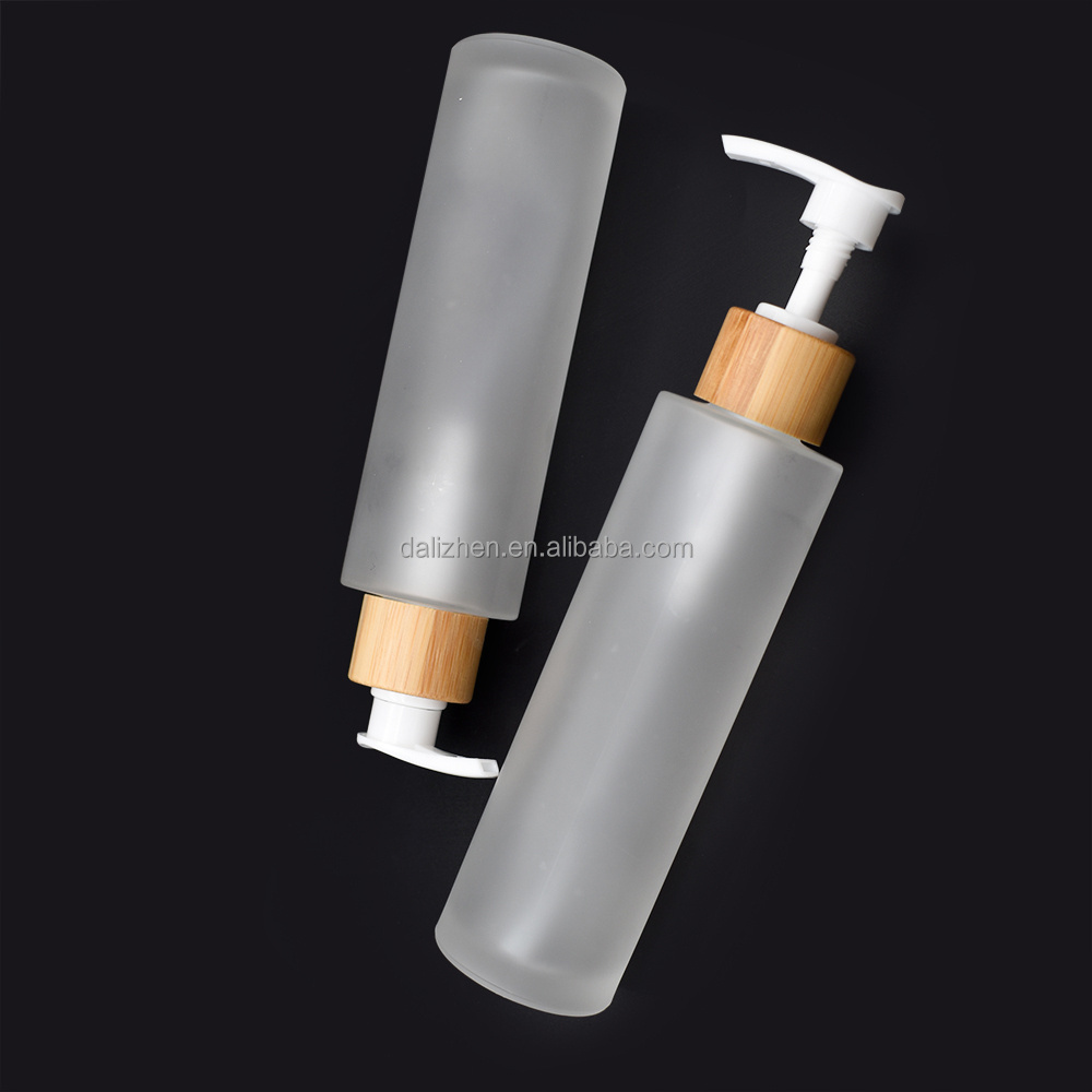 Eco Friendly Cosmetic Skincare Packaging 50Ml 60Ml 80Ml 100Ml Bamboo Lid Frosted Glass Serum Lotion Pump Bottle