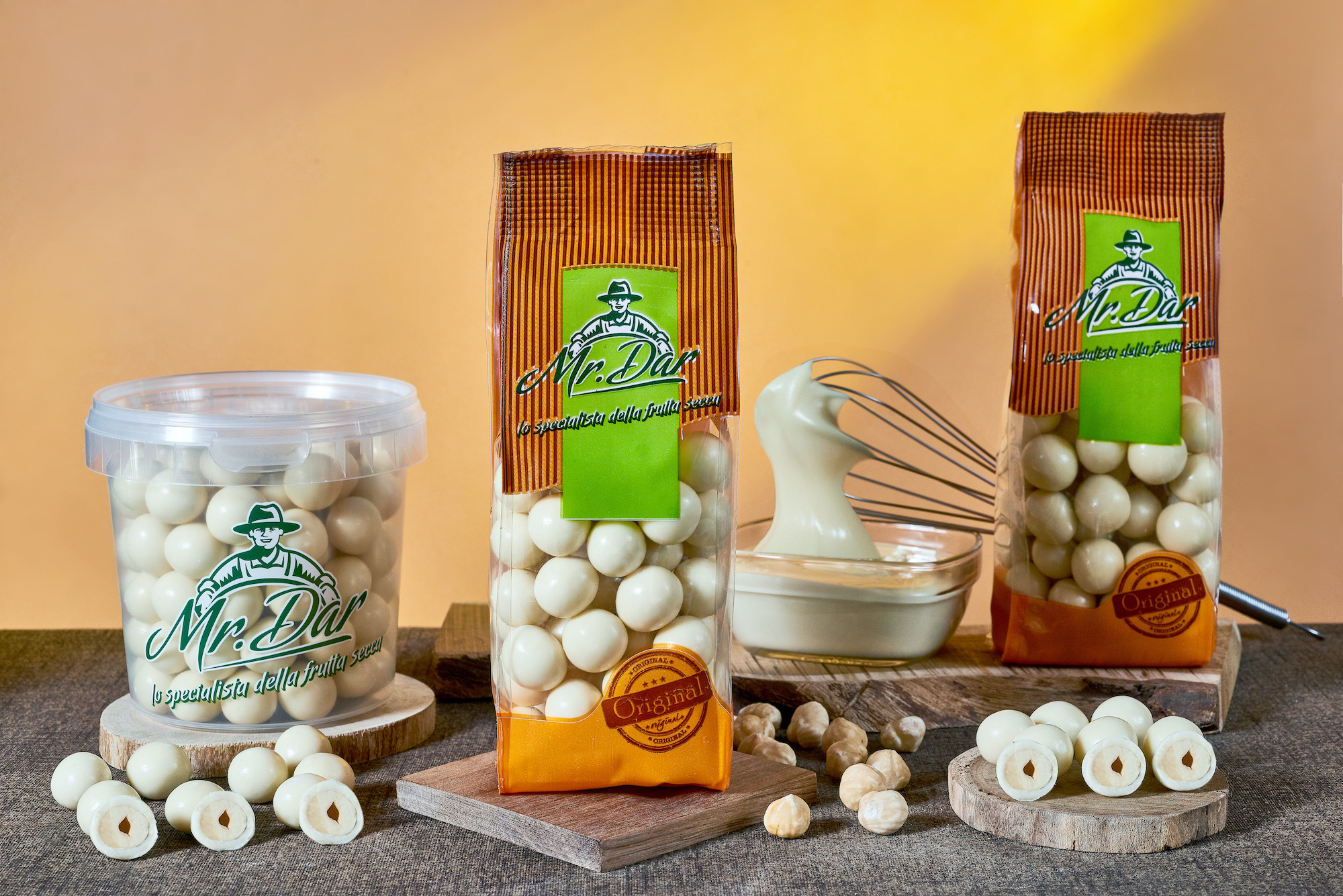 Superior quality roasted hazelnuts covered with white  chocolate in 1 kg ten-pieces box for b2b sales