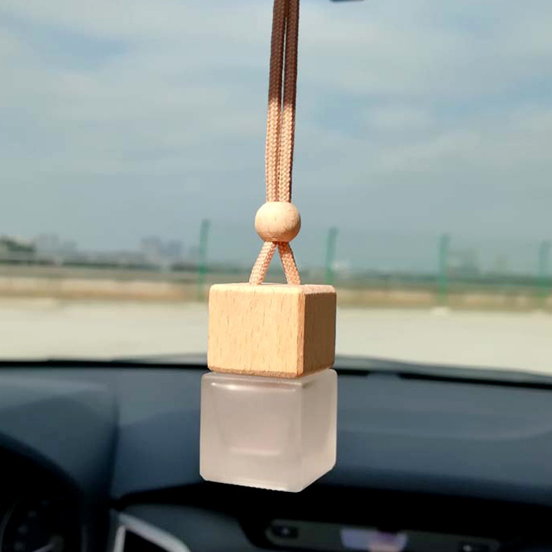 Wholesale 10ml air freshener diffuser empty frosted car hanging perfume bottle with wooden cap