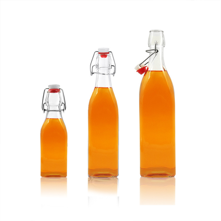 Hot sale 16oz beverage glass bottle with swing top closure