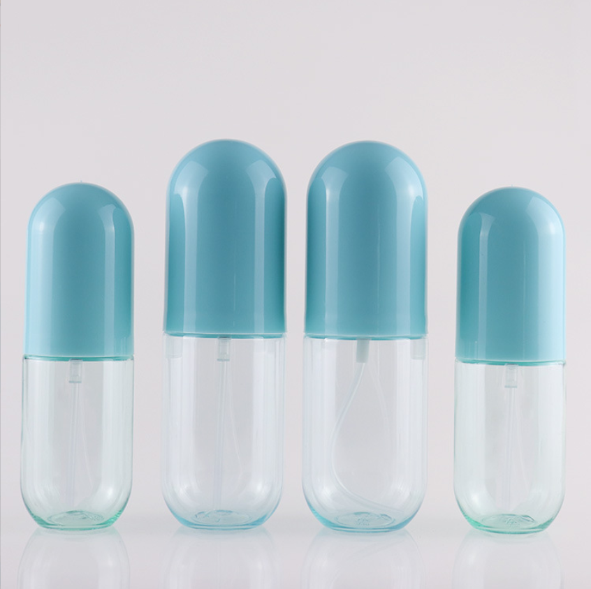 New style small spray bottle travel size capsule shape refillable 30ml round plastic mist spray bottle