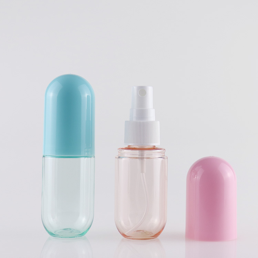 New style small spray bottle travel size capsule shape refillable 30ml round plastic mist spray bottle