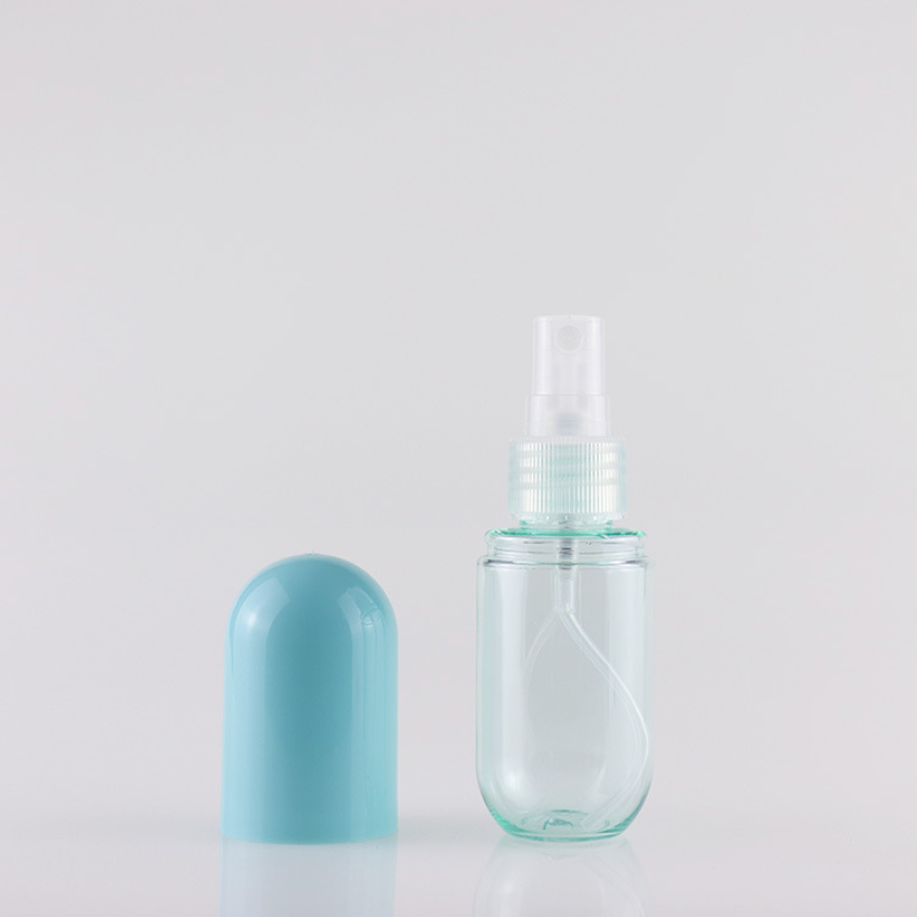 New style small spray bottle travel size capsule shape refillable 30ml round plastic mist spray bottle