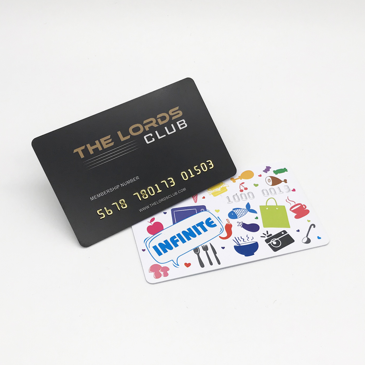 PVC membership card with gold and silver embossing card number