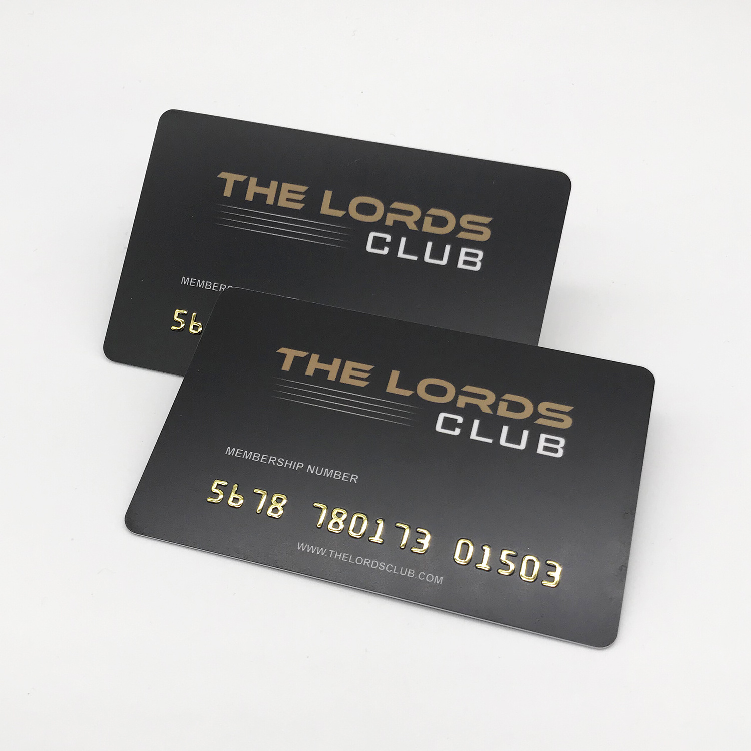 PVC membership card with gold and silver embossing card number