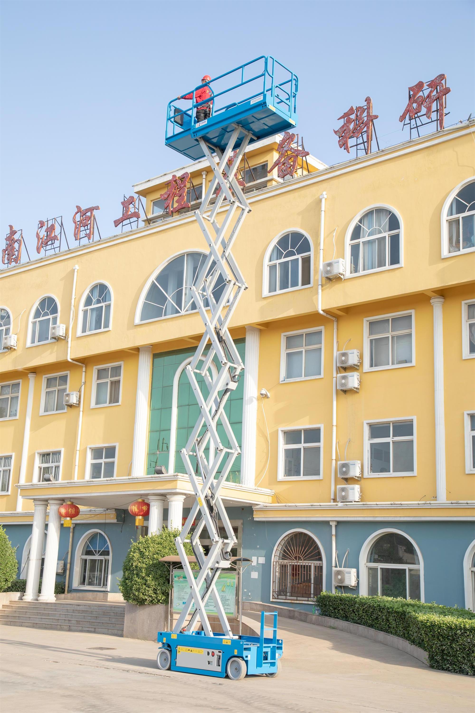 500kg 300kg 1ton 2 tons vertical scissor lift electric hydraulic lift platform aerial man lift in warehouse