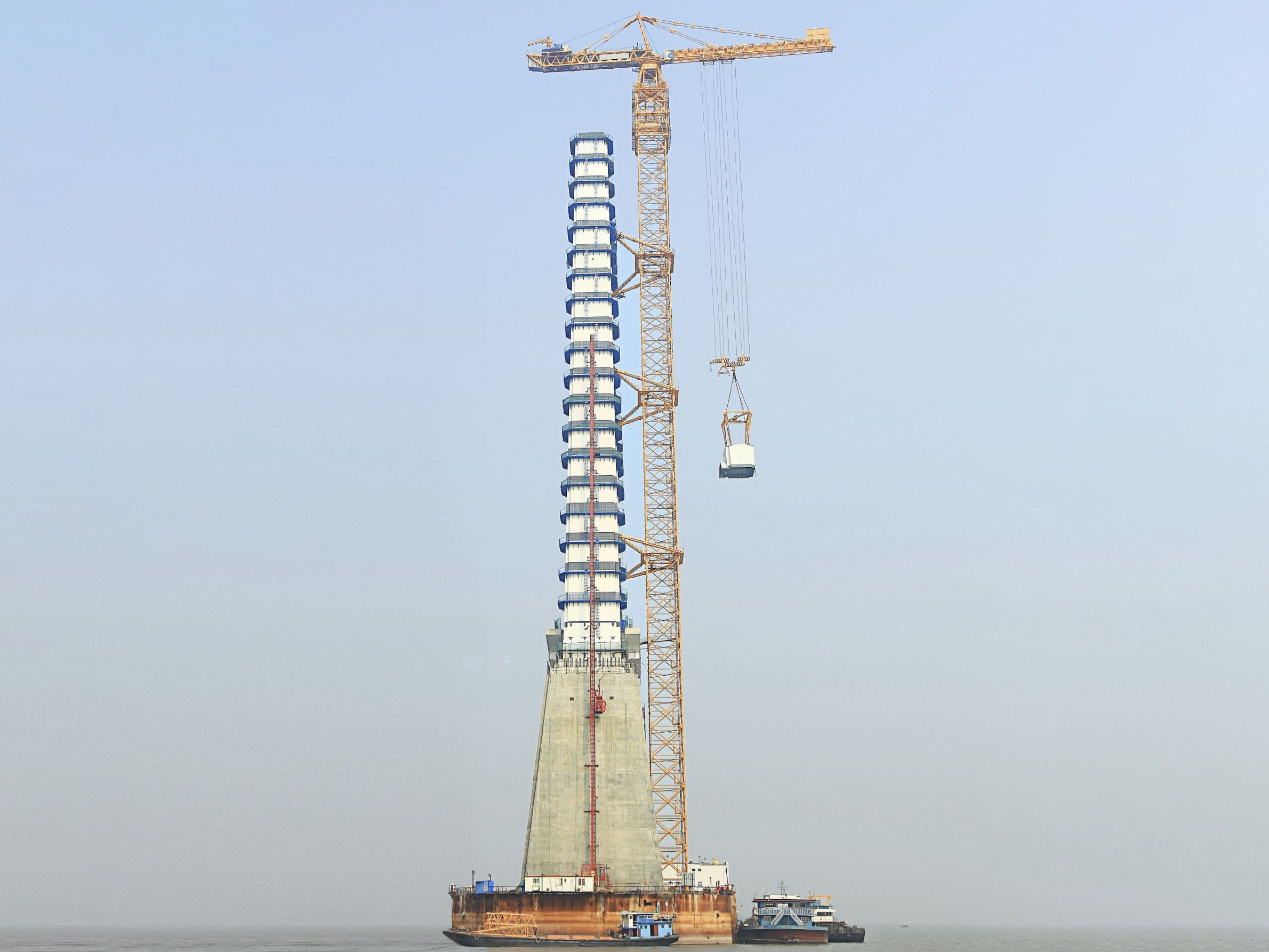 Factory Price Model No. 7025 Tower Crane Flat Top Tower Crane for Construction Provided 40 Construction Works 70 M Boom 12 Ton