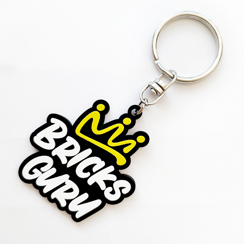 Custom raised logo shoe 3d mini sneaker keychains with multi colors pvc rubber key ring wholesale