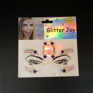 Hot selling factory direct wholesale face gems rhinestone glue on iron on LED glow in the dark stickers