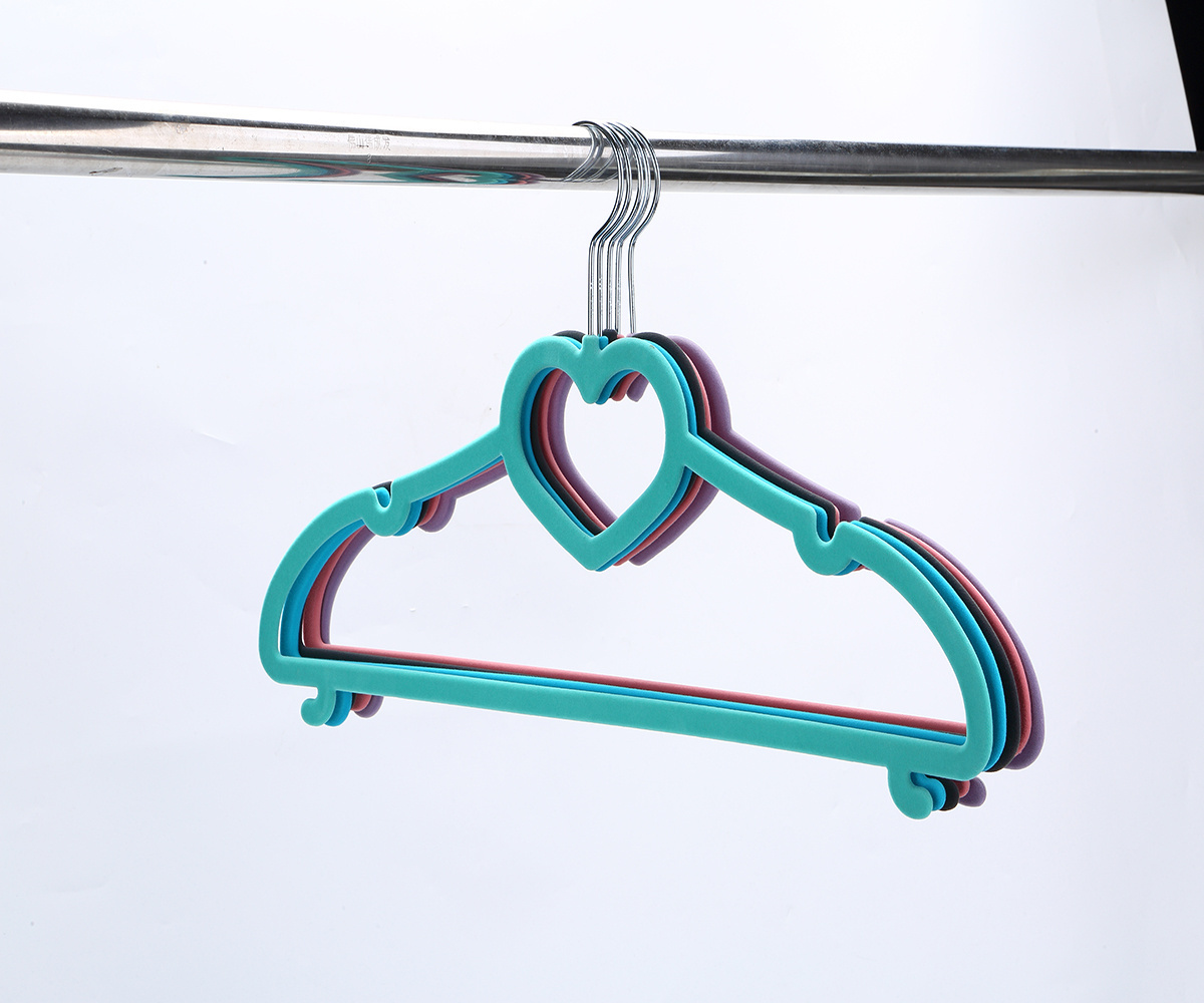 Factory wholesale ABS flocked non-slip coat rack clothing shop finishing non-marking storage home hanging magic clothes rack