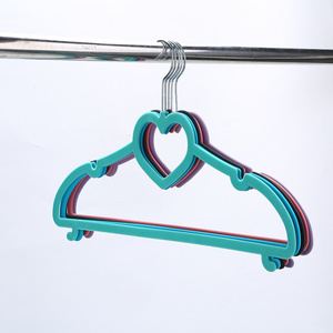 Factory wholesale ABS flocked non-slip coat rack clothing shop finishing non-marking storage home hanging magic clothes rack