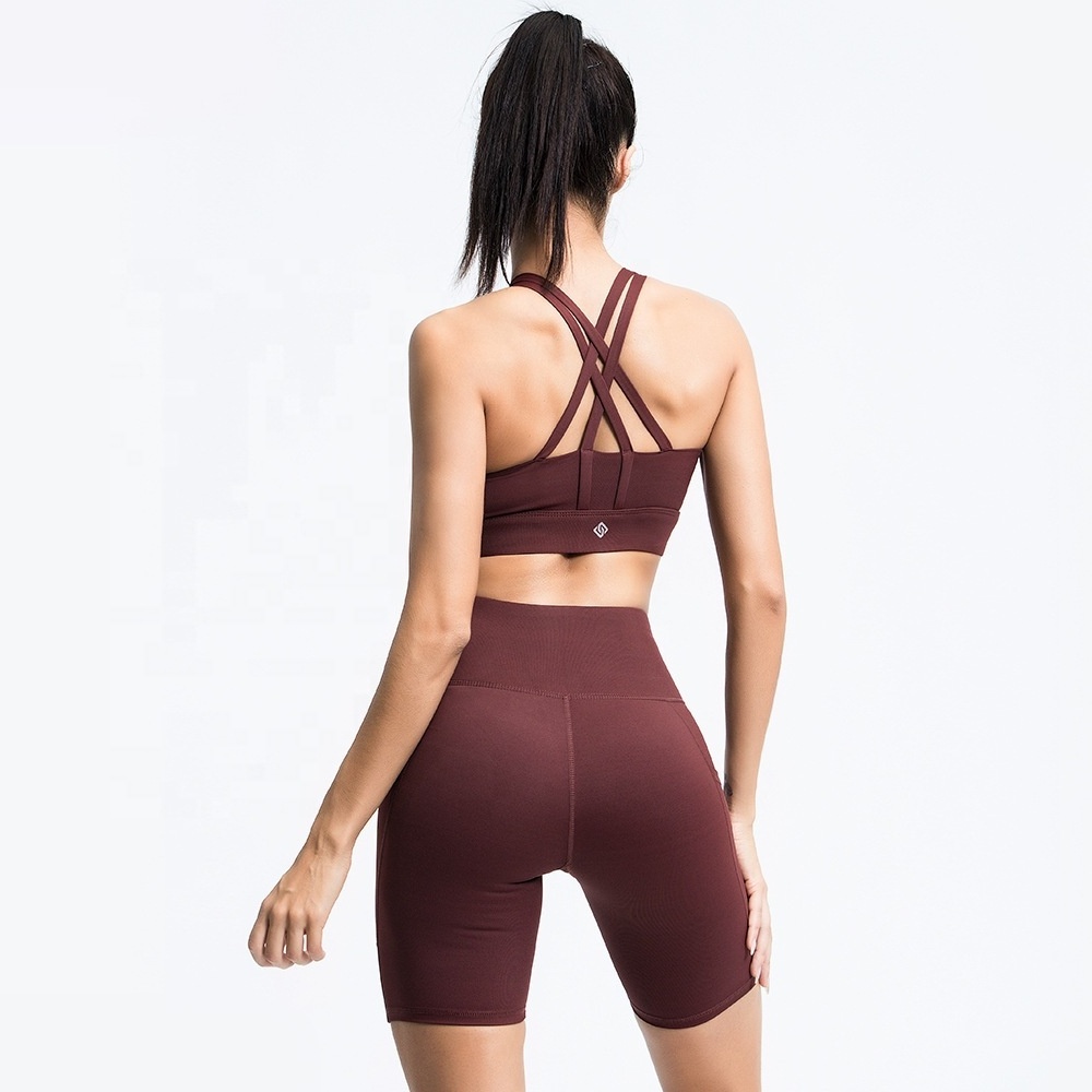 Hot sales active wear gym seamless  halter backless bra shorts with pocket can be printed logo women fitness yoga set for women