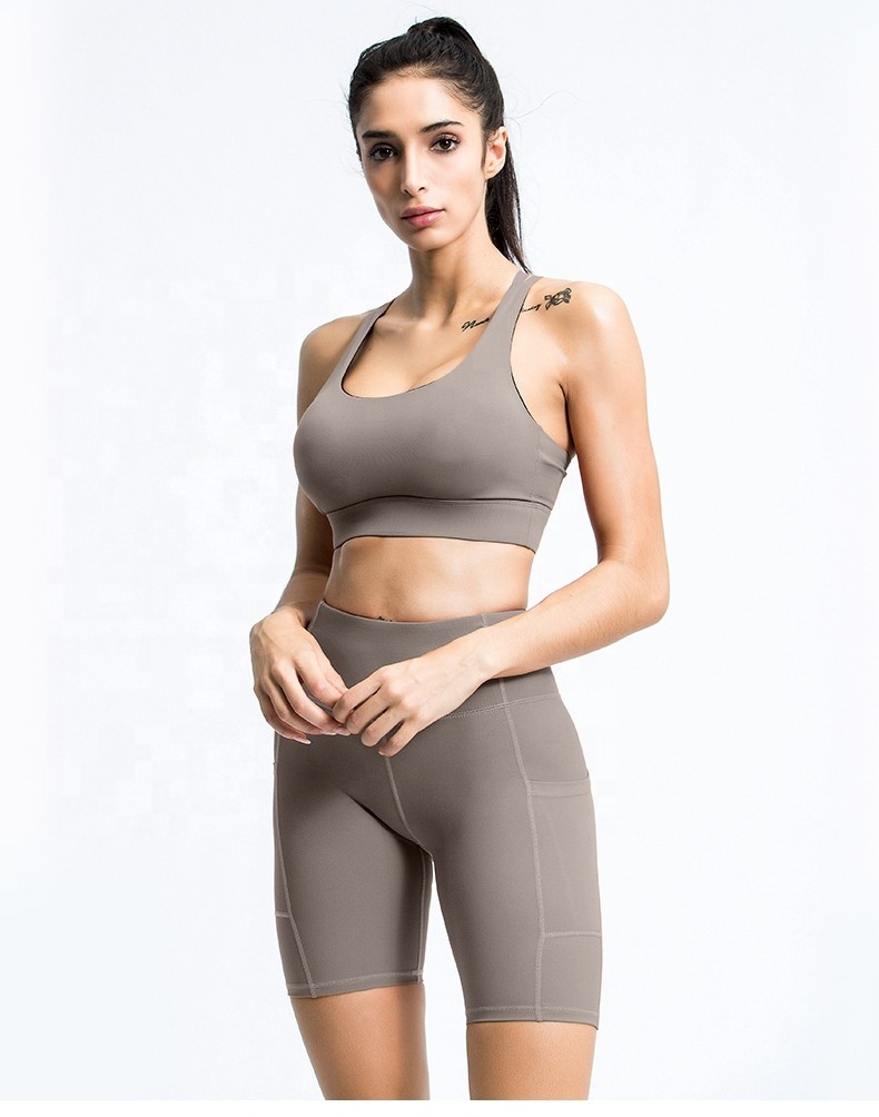 Hot sales active wear gym seamless  halter backless bra shorts with pocket can be printed logo women fitness yoga set for women