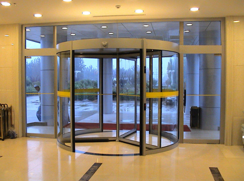 Glass door of office building Rotating glass door of hotel