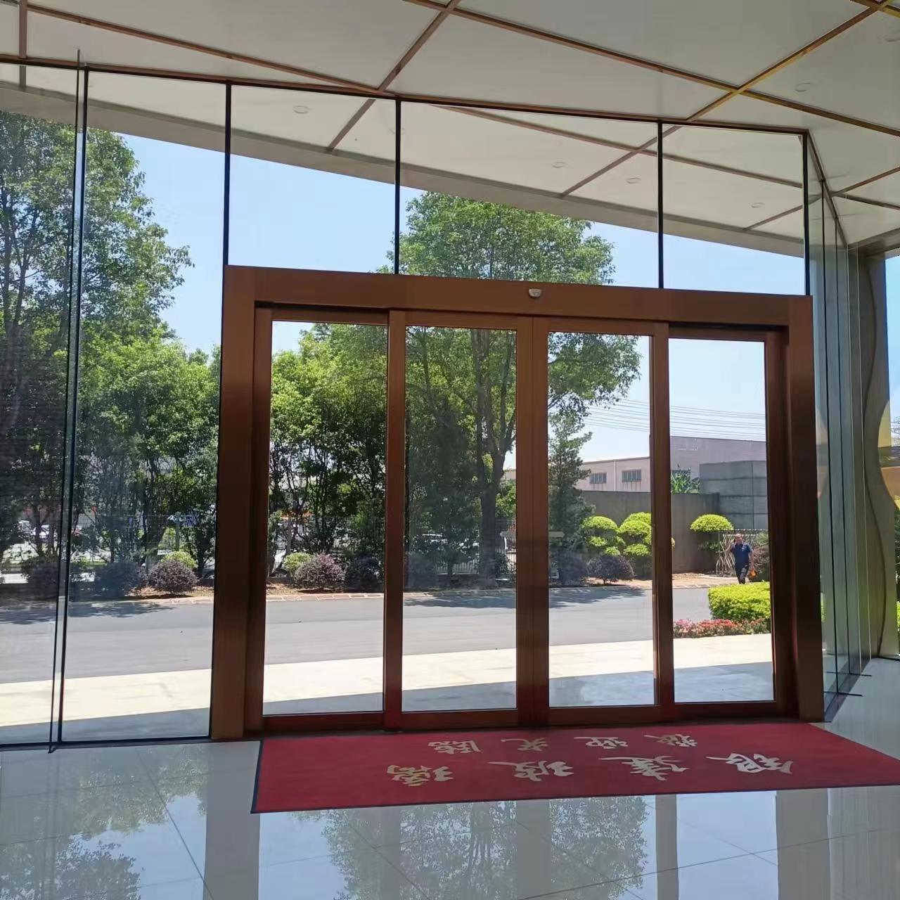 Glass door of office building Rotating glass door of hotel