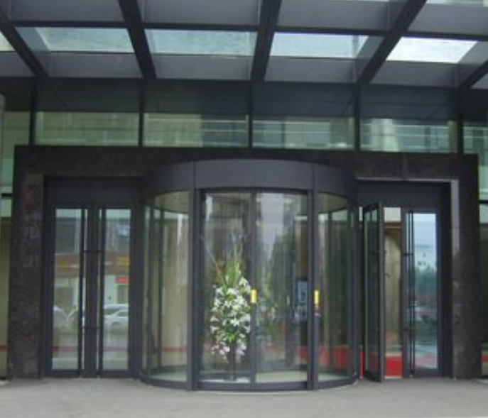 Glass door of office building Rotating glass door of hotel