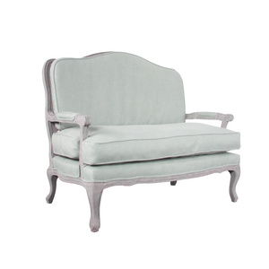 La Jolla Loveseat with solid birch frame and rattan back for french style living