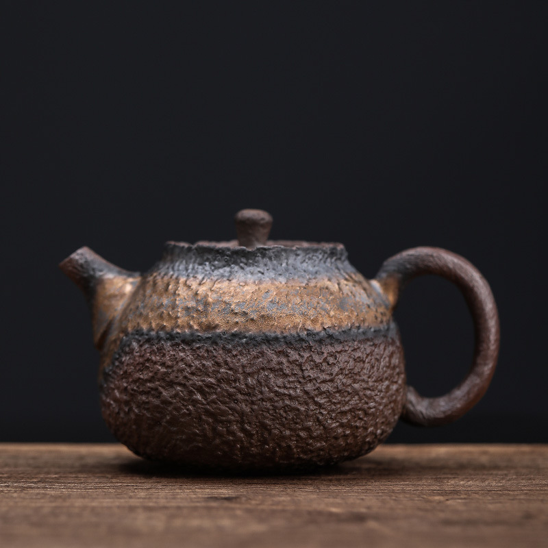 Stone is the pots Handmade Retro Japanese style coarse pottery small teapot gold Iron glaze single teapot Pu'er tea maker