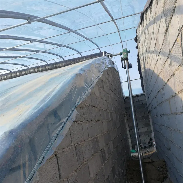 Chinese solar greenhouse double arch galvanized steel structure waterproof warm quilt cold winter warm passive solar greenhouse