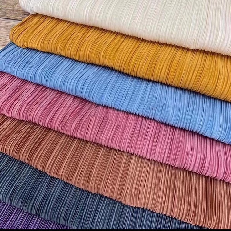 Hot sale Waterproof Shiny 100% Polyester Fabric Plain soft pleated satin fabric