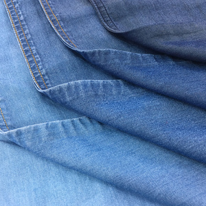 Good quality factory directly  100% Tencel  5.8/5.4oz  denim jeans fabric for trousers dress in stock