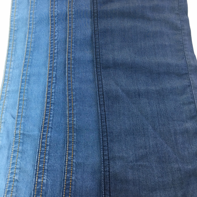 Good quality factory directly  100% Tencel  5.8/5.4oz  denim jeans fabric for trousers dress in stock