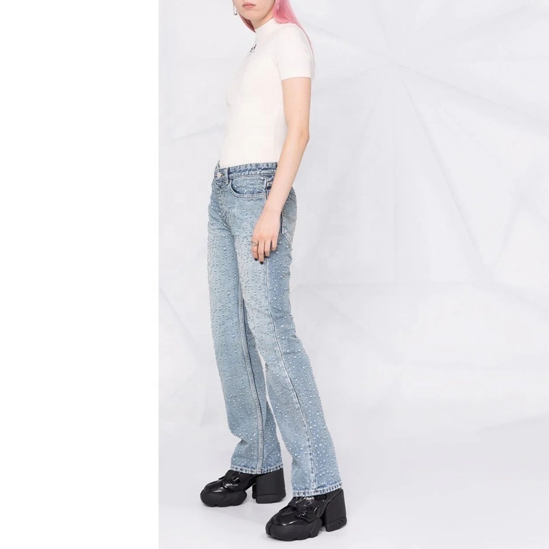 Woman light blue damaged jeans unique washed allover distressed ripped hole jeans for women